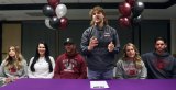 Koy Davis with members of his family including father Byron Davis and mom Roshelle Wilhite. Davis will play football for Iowa's Morningside College.